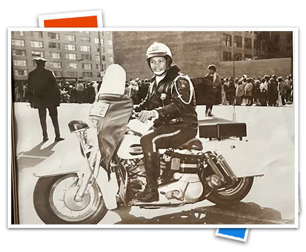 Charles Cobbertt on assignment with his Motorcycle